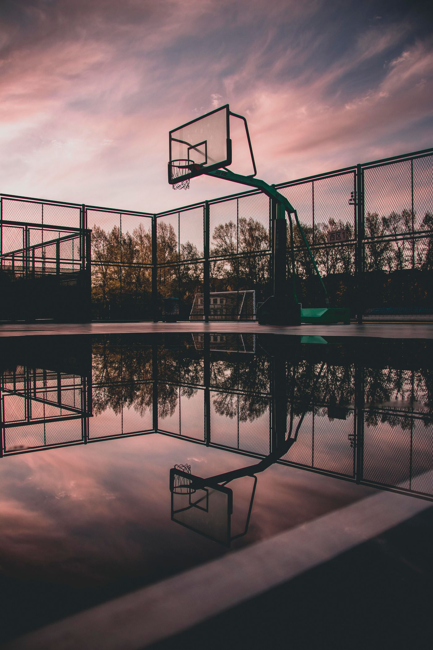 Outdoor court at dusk (temporary imagery)