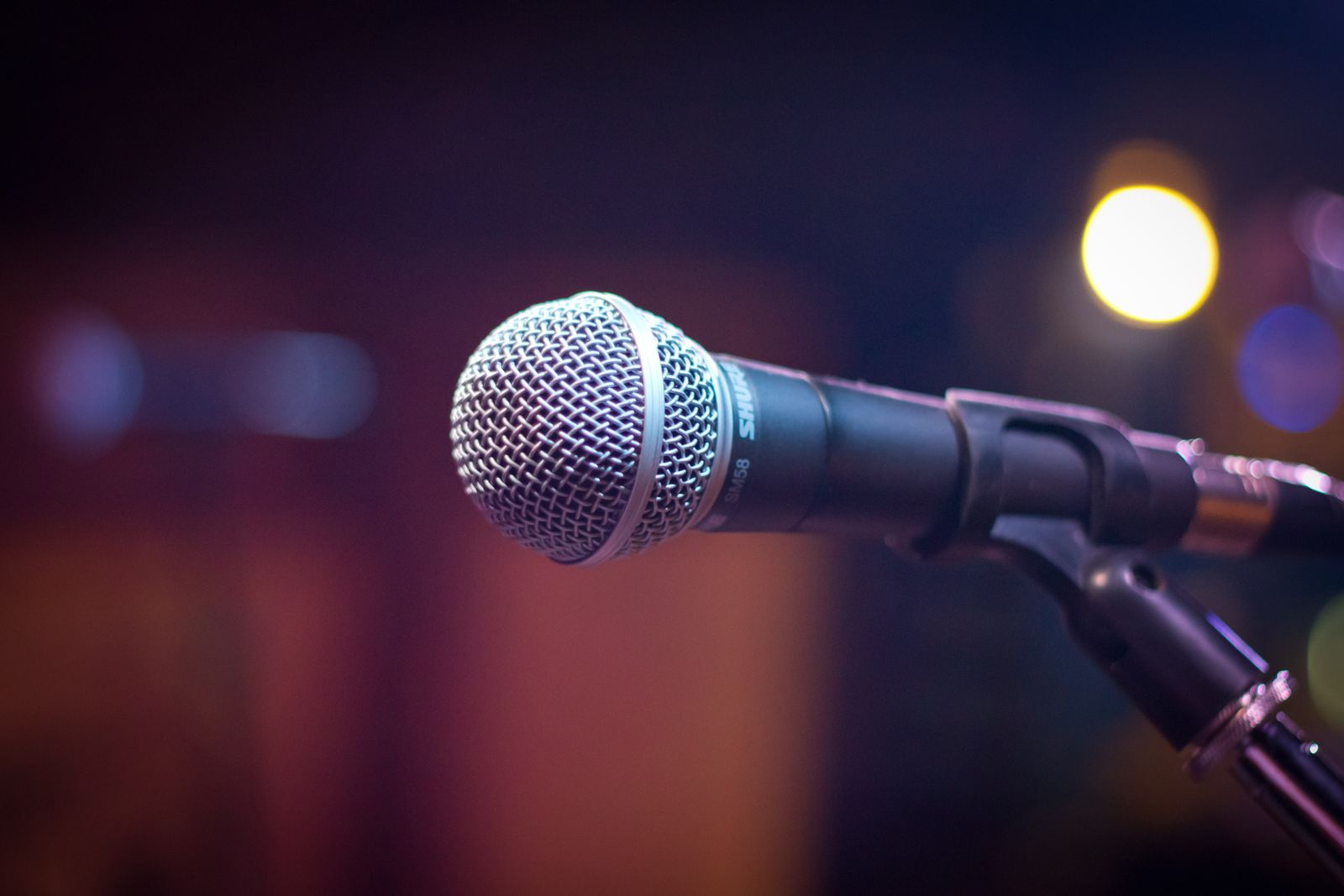 Microphone under stage lights at a press event
